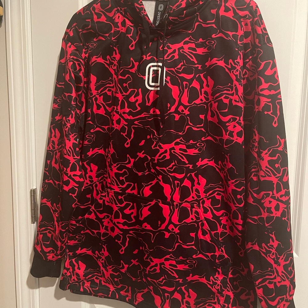 Pink and Black Patterned Hoodie. Pullover One double pocket in front.